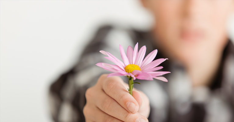 Teen Gives Flowers To All Female Classmates So They ‘Feel Loved And Special’ - Featured image