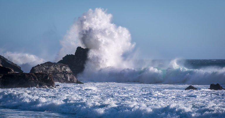 Crashing wave appears to show face of Poseidon the fearsome god of the sea - Featured image