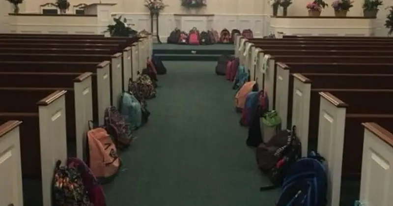 line of backpacks