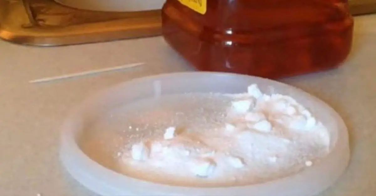 plastic container with a white powder