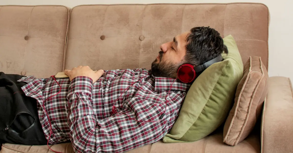 a man napping on a couch