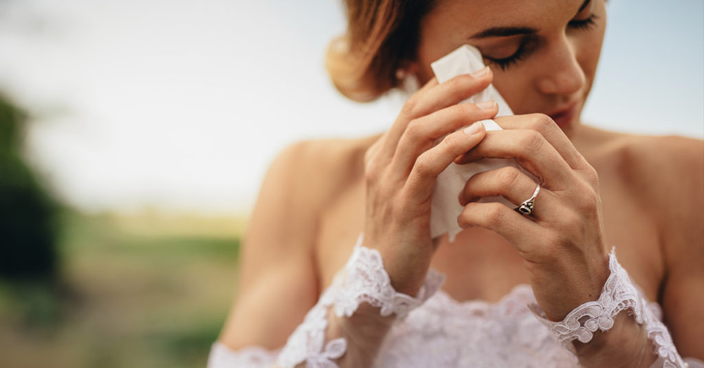 Bride Cries While Dancing With A Cop, Then They See The Back Of Her Dress - Featured image