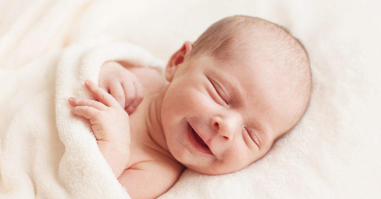‘Smiley’ baby born with no eyes finally found a happy home after mom abandoned him - Featured image