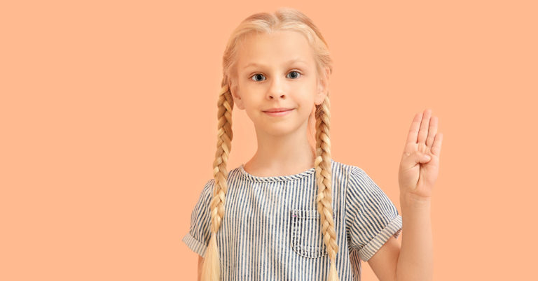 Little Girl With Deaf Parents Signs For Them During Christmas Concert - Featured image