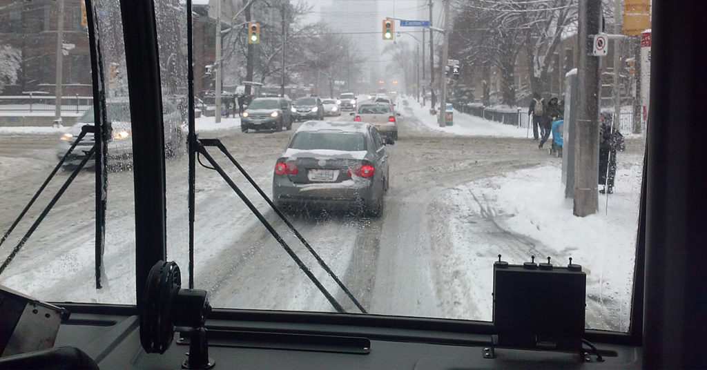Bus Driver Finds in His New Apartment Photo of Woman He Once Kicked off the Bus into the Cold – a Short Story - Featured image
