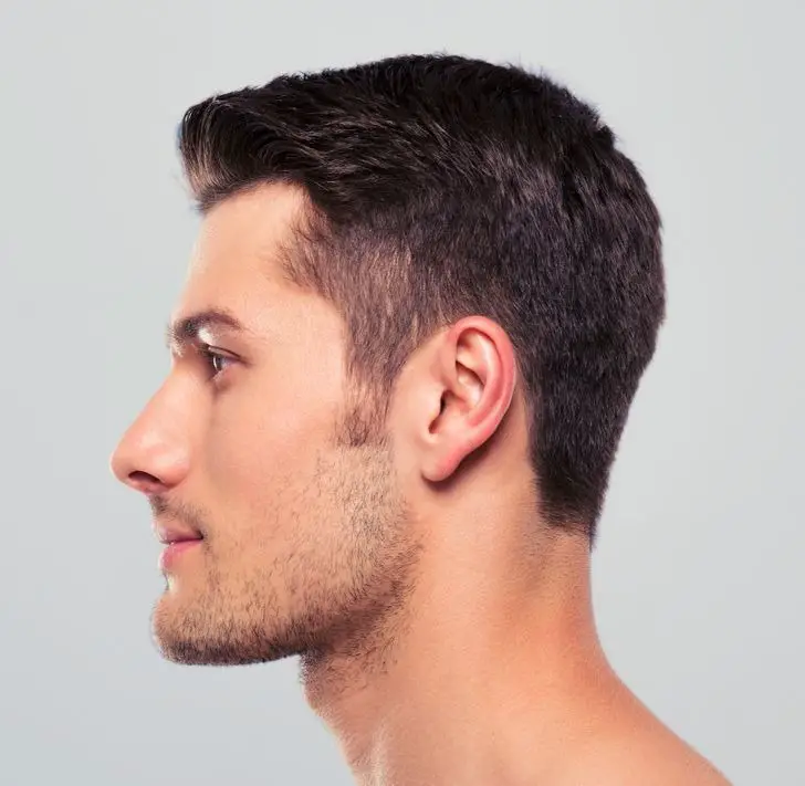 side profile of a man's left side 