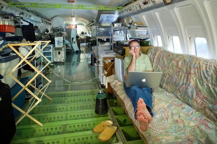 Campbell working in his furnished plane.