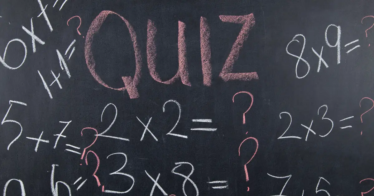 Quiz along with other math questions written on a chalk board