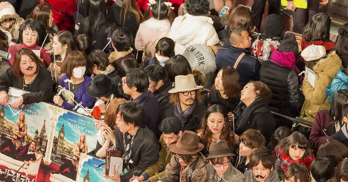 Johnny Depp amongst a large crowd