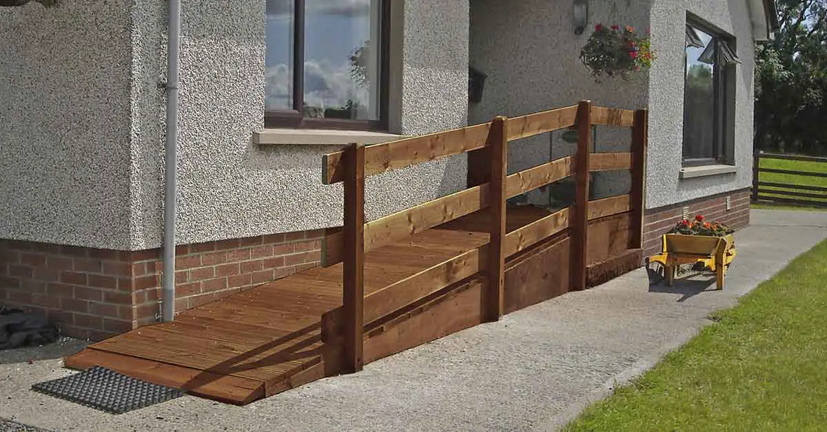 home with wooden ramp to make it wheelchair accessible