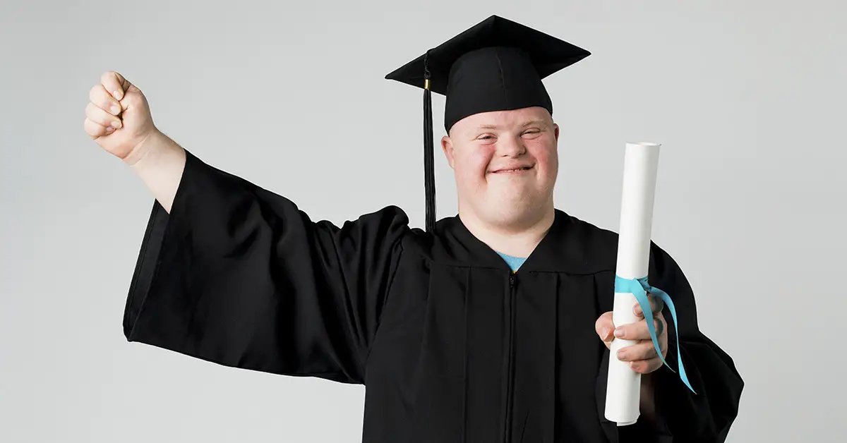 Person with down syndrome in graduation gown