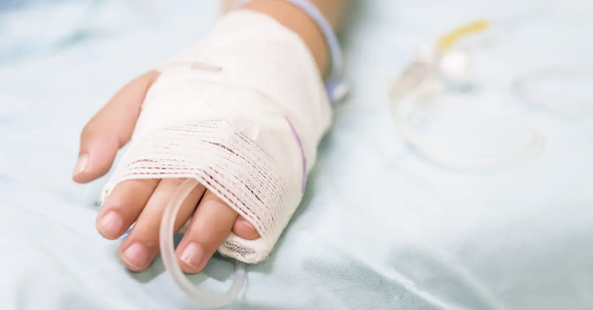 bandaged hand with IV