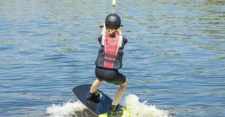 Wakeboarder is Being Filmed When Cameraman Notices She is Not Alone in the Water - Featured image