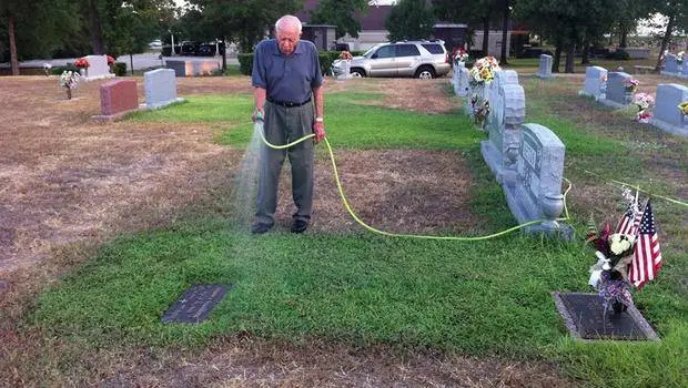 He watered the late soldier's grave plot too