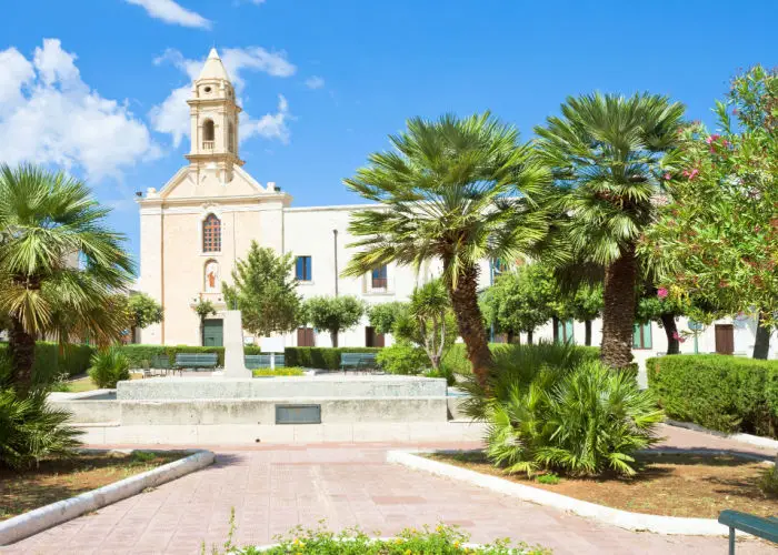 Presicce, Apulia, Italy - Relaxing in the calm park in front of the church
