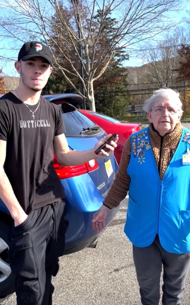 influencer with elderly Walmart worker