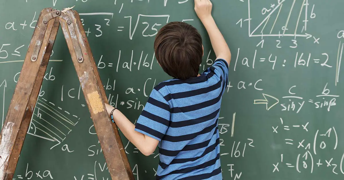 child using a ladder and writing math equations on chalkboard