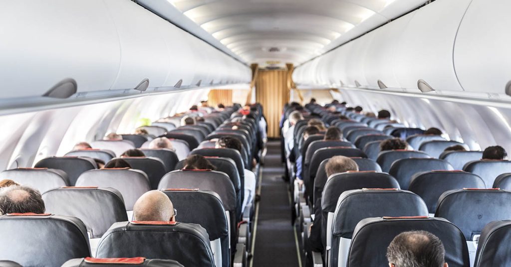 Airline Passenger Says He Wanted To Slap Man Who Refused To Switch Seats So He Could Sit By His Wife - Featured image
