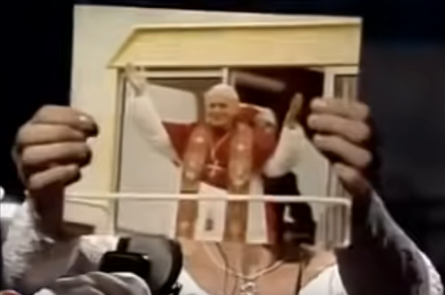 She tore up a photo of Pope John Paul II
