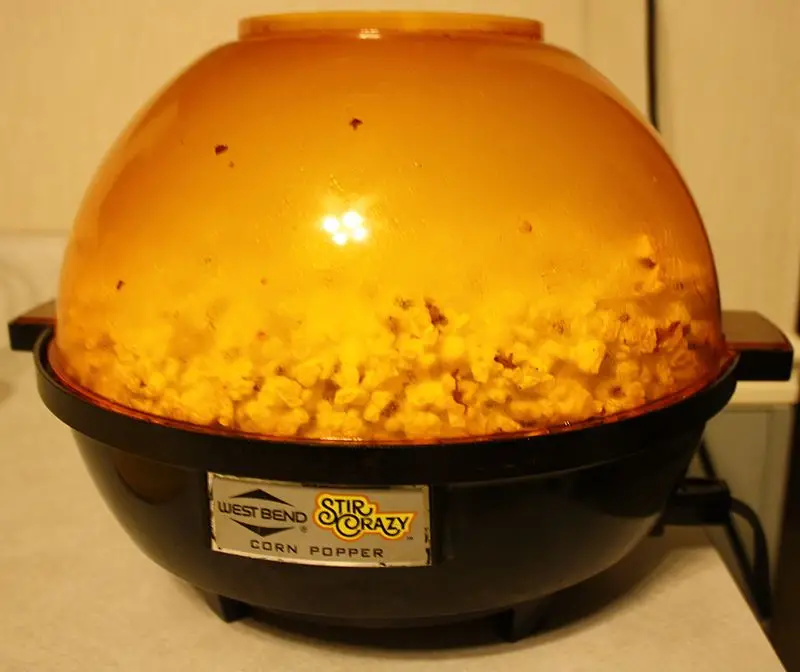 An electronic popcorn popper by West Bend.
