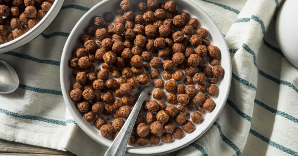 Sweet Cocoa Chocolate Sugar Cereal Puffs with Milk
