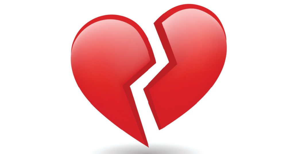 Broken Red Heart Emoji Vector. The isolated vector red love heart broken in two emoji icon, breaking heart, brokenhearted.
