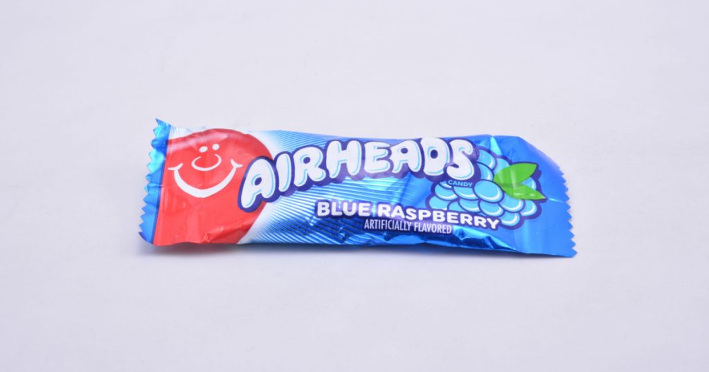 MANILA, PH - JULY 9 - Airheads candy blue raspberry flavor on White background July 9, 2021 in Manila, Philippines.
