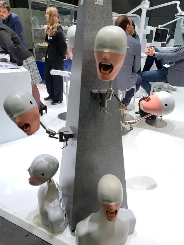 several disembodied mannequin heads