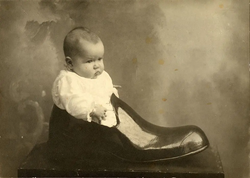 baby in giant shoe