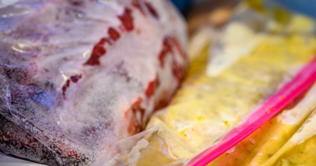 Freezer burned vegetables in plastic wrapping
