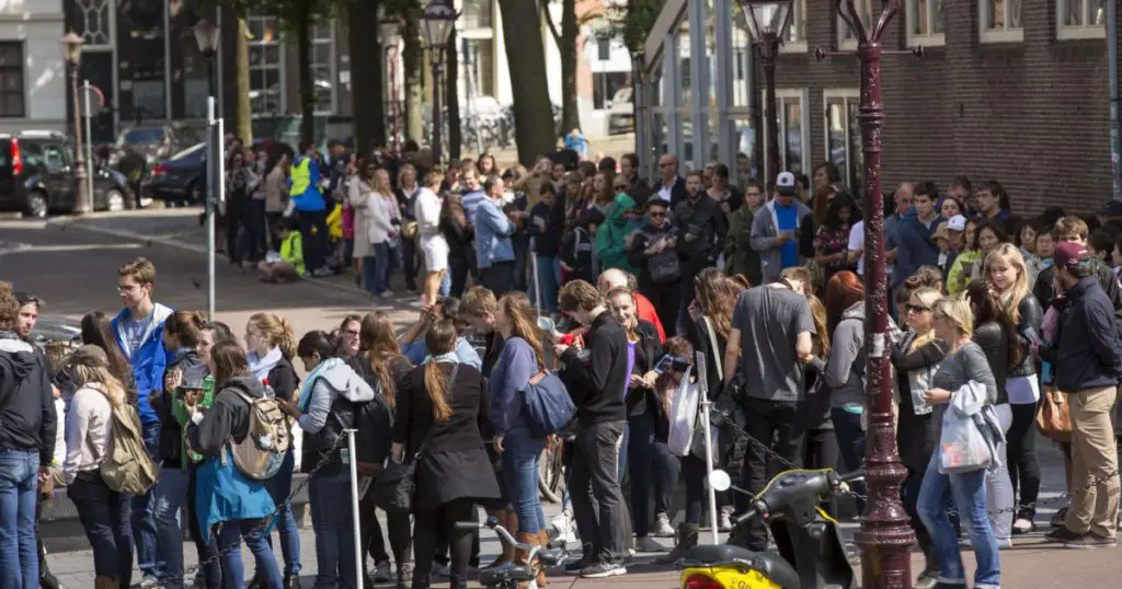 Amsterdam, Netherlands - June 29: People queuing at the Anne Frank house and holocaust museum in Amsterdam, Netherlands, on June 29, 2014. Anne Frank house is a popular tourist destination.
