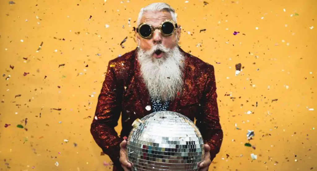 Bearded man holding disco ball