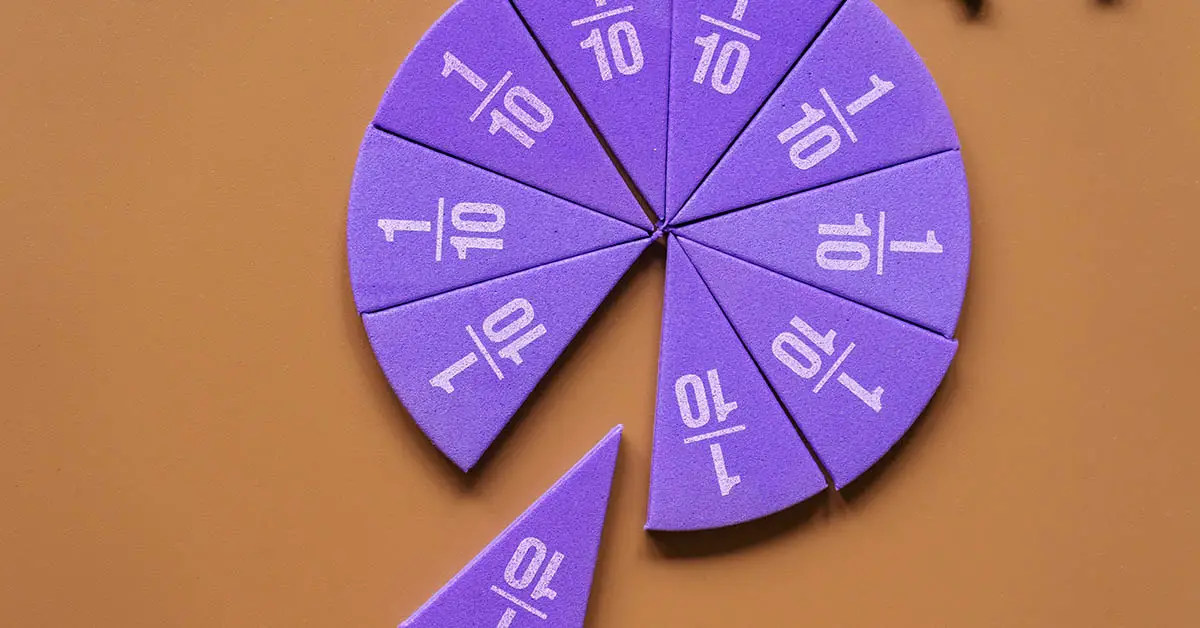 Violet pieces of fractions on a table. Close up math material for study. Back to school, geometry lessons, mathematical education for preschooler. Creative study. background with numbers