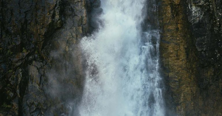 Hiker Spots Secret Behind Famous Waterfall in China - Featured image