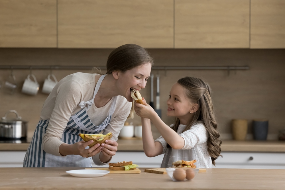 mom and daughter in kitchen