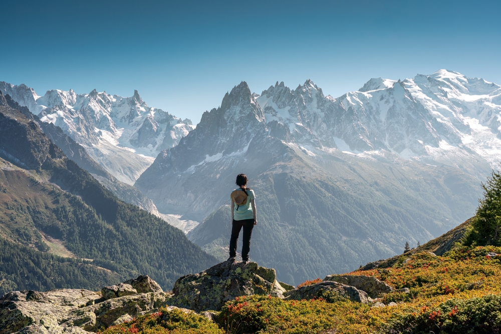 woman on top of mountain