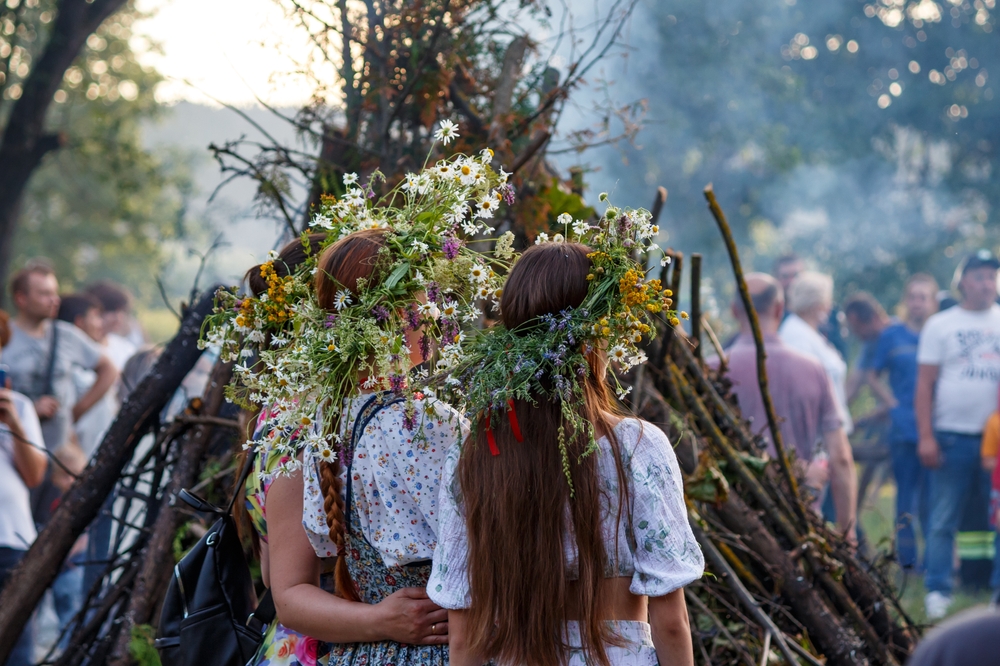 A wreath of wildflowers on the heads of girls during the summer Slavic holiday Ivan Kupala dedicated to the summer solstice. Russia