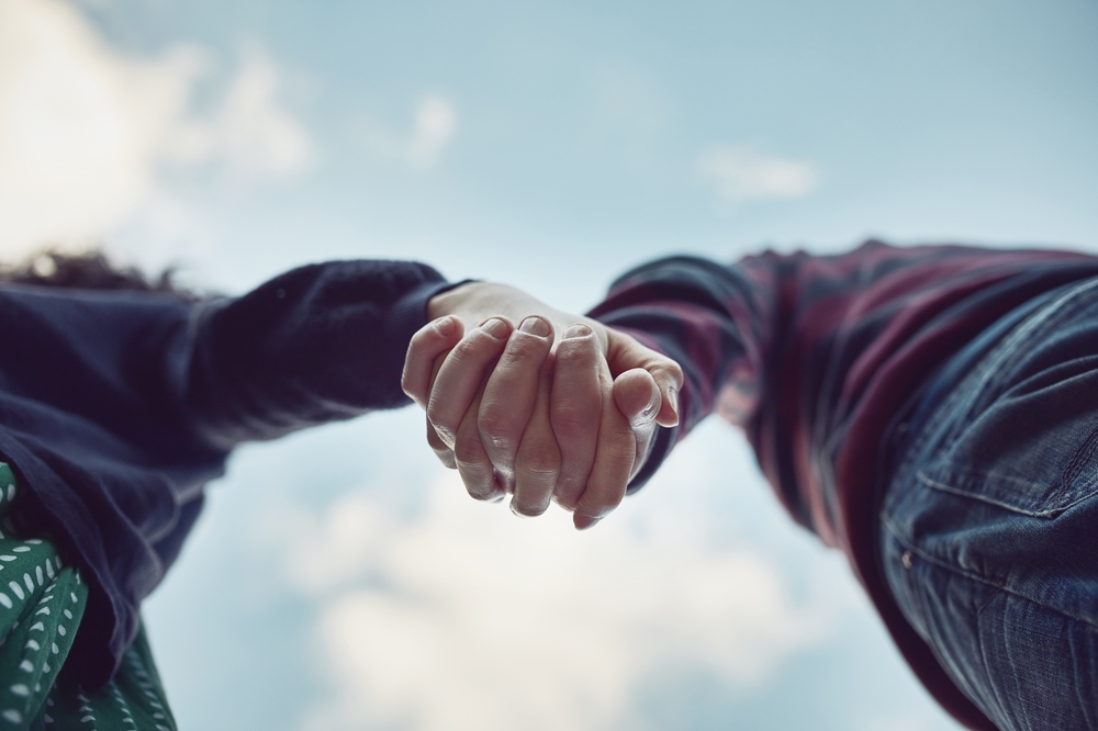 couple holding hands