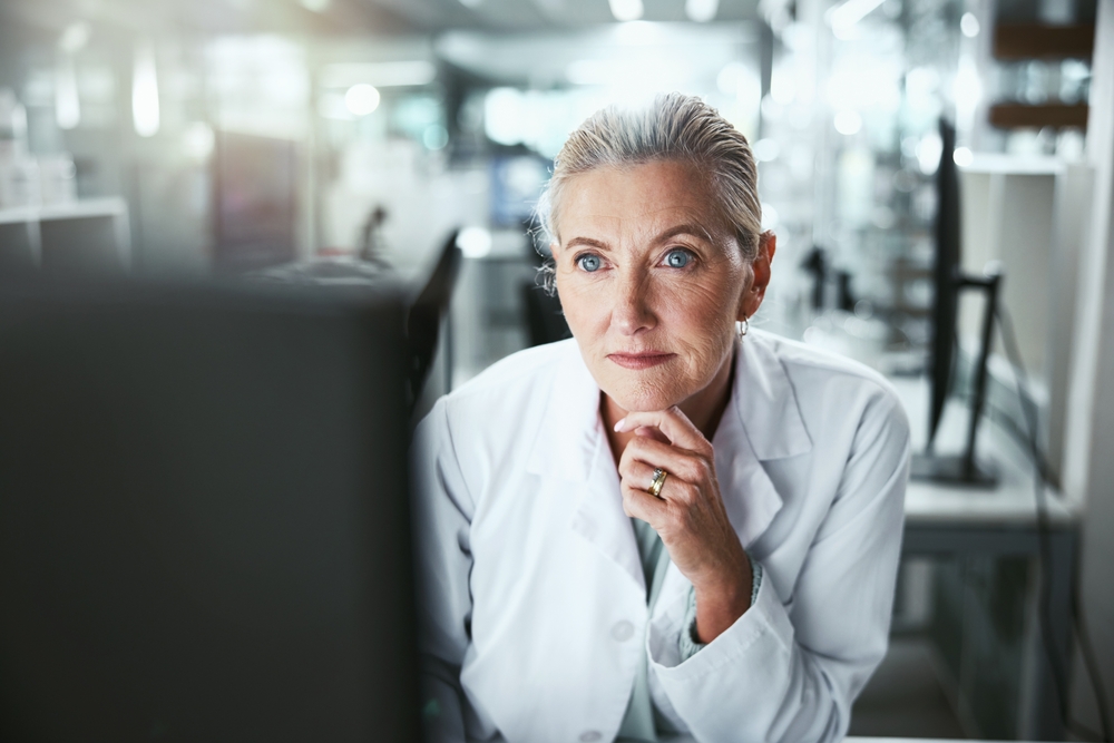 woman looking at laptop
