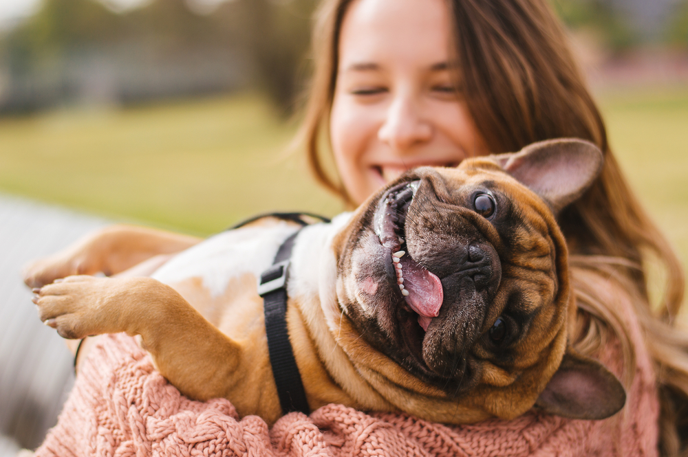 woman holding pet