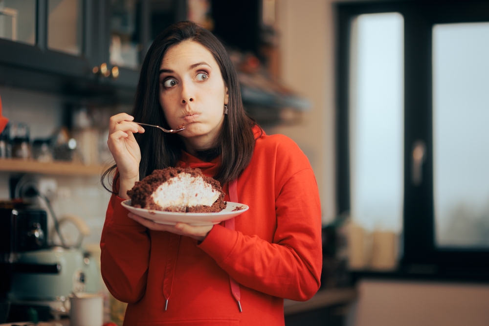 woman eating cake