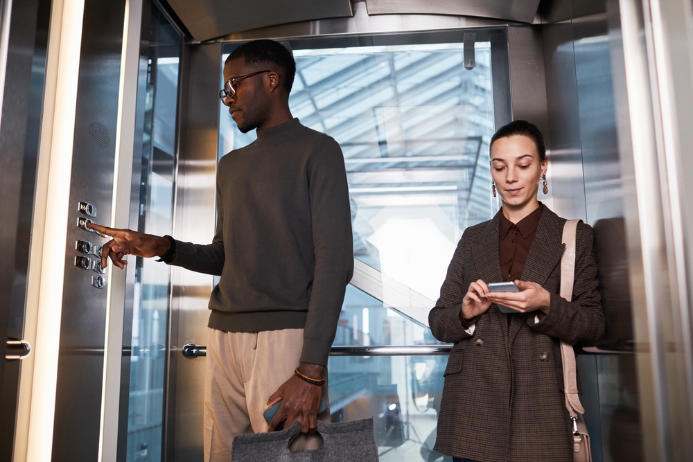 two people in an elevator