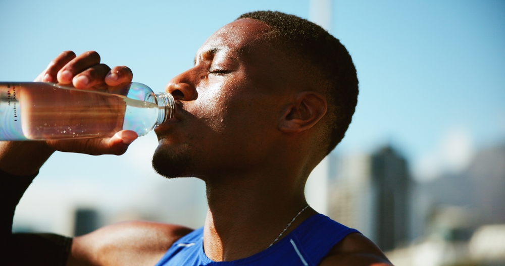 man drinking water