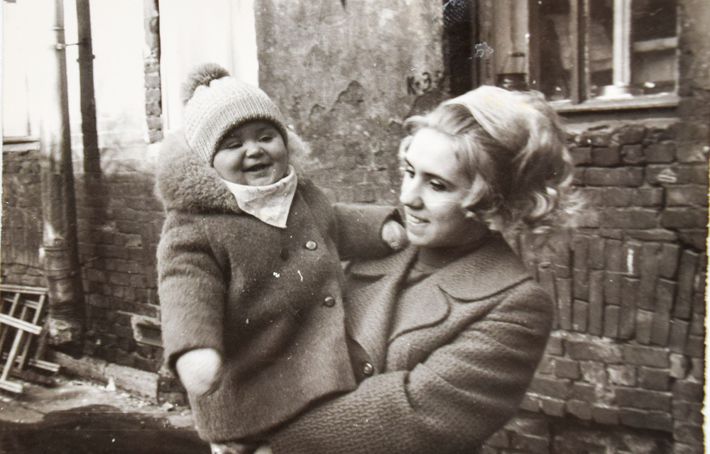 USSR, LENINGRAD - CIRCA 1970: Vintage photo of happy young mom with baby girl daughter